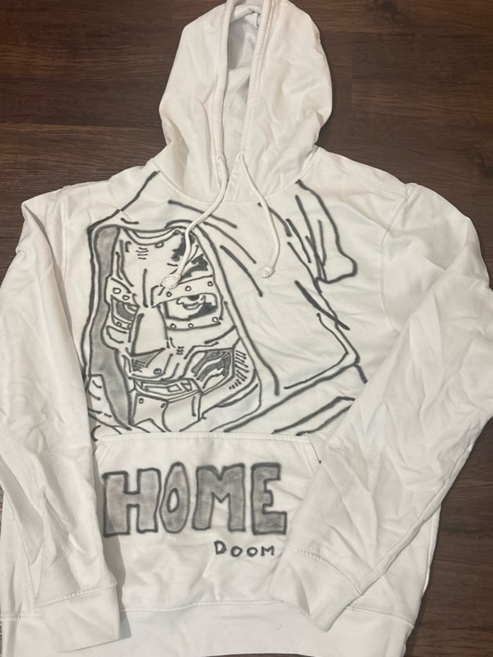White Graphic Hoodie with 'HOME' and Doom Illustration